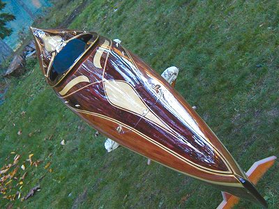 Artistic cedar strip kayak builder, lightweight high performance 